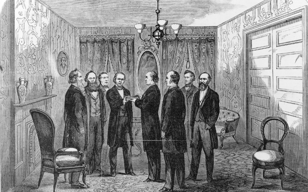 The image is a black and white pencil drawing featuring eight men dressed in topcoats, vests, and trousers fashionable in the 19th century. Two of the men are engaged in conversation while the others look on, talking about life insurance. There is a three-prong light above the men, long heavy curtains behind them and two velvet chairs flank the room on either side. The walls are ornately decorated with swirls.